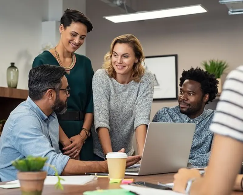 a group of people around a table