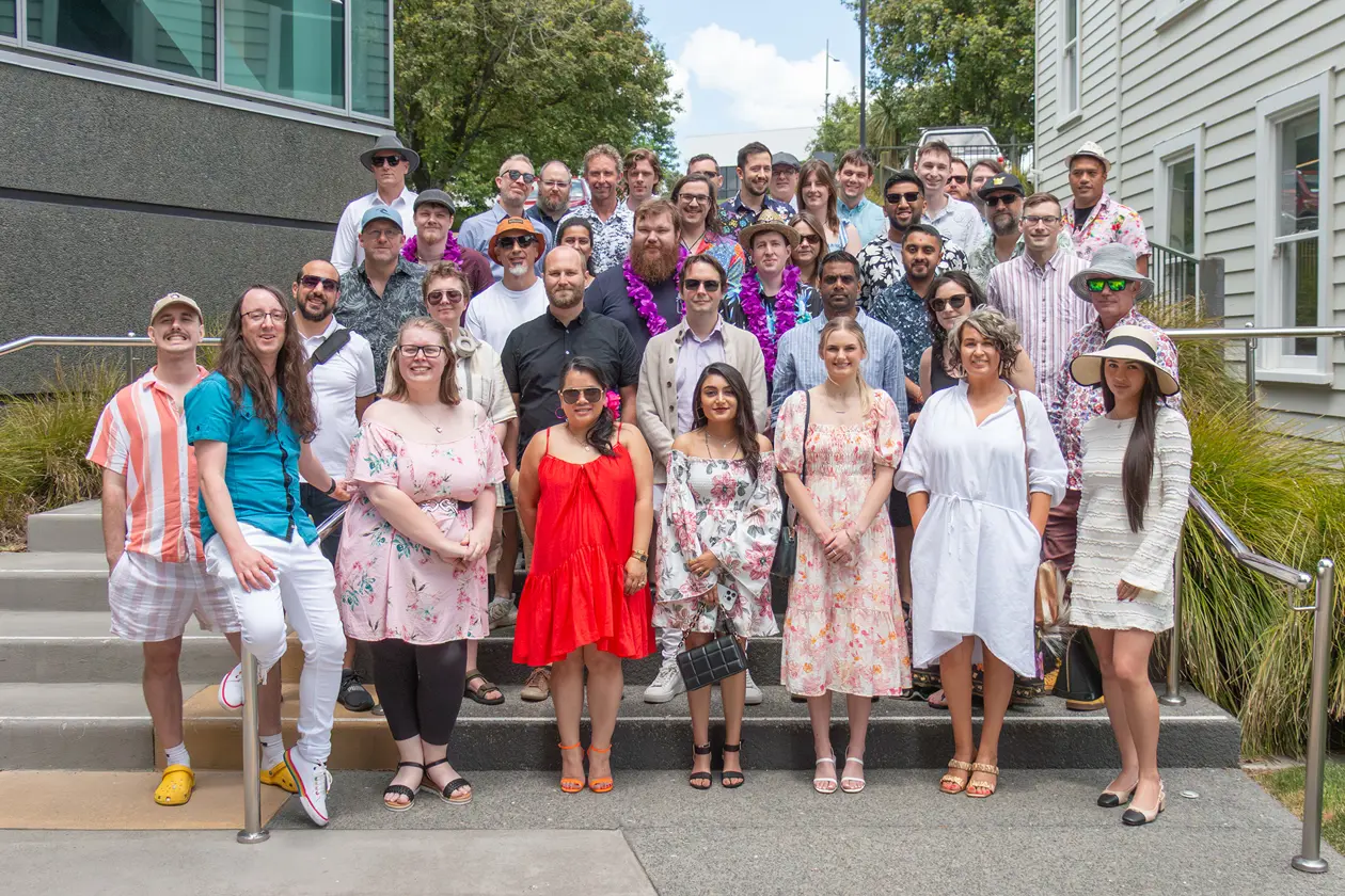 a group of people posing for a photo