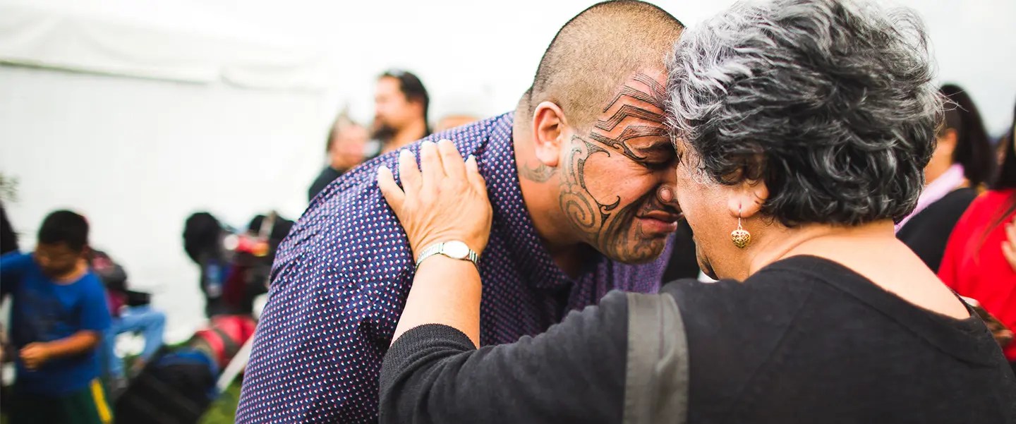 a man with a tattoo on his face