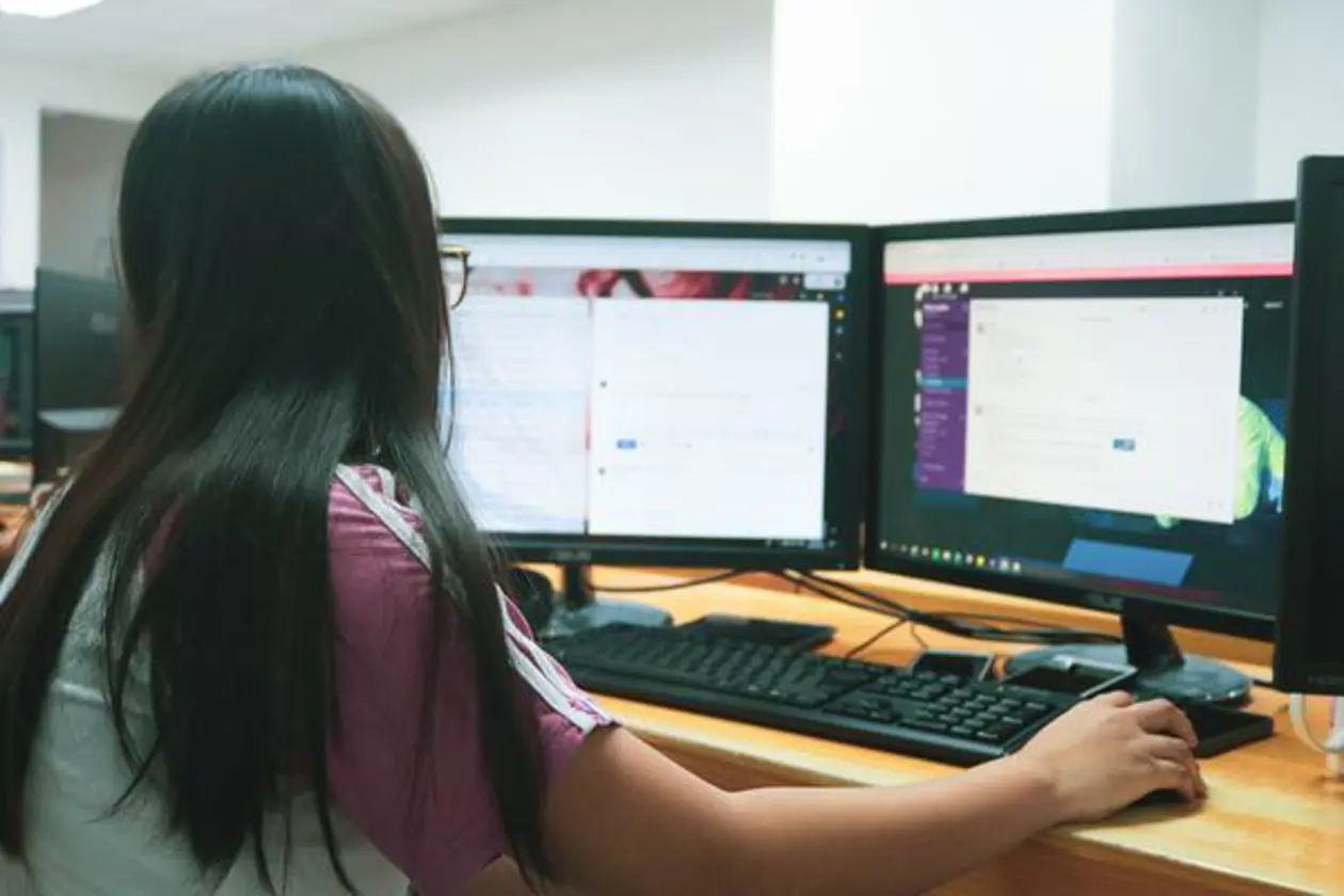 a woman using a computer