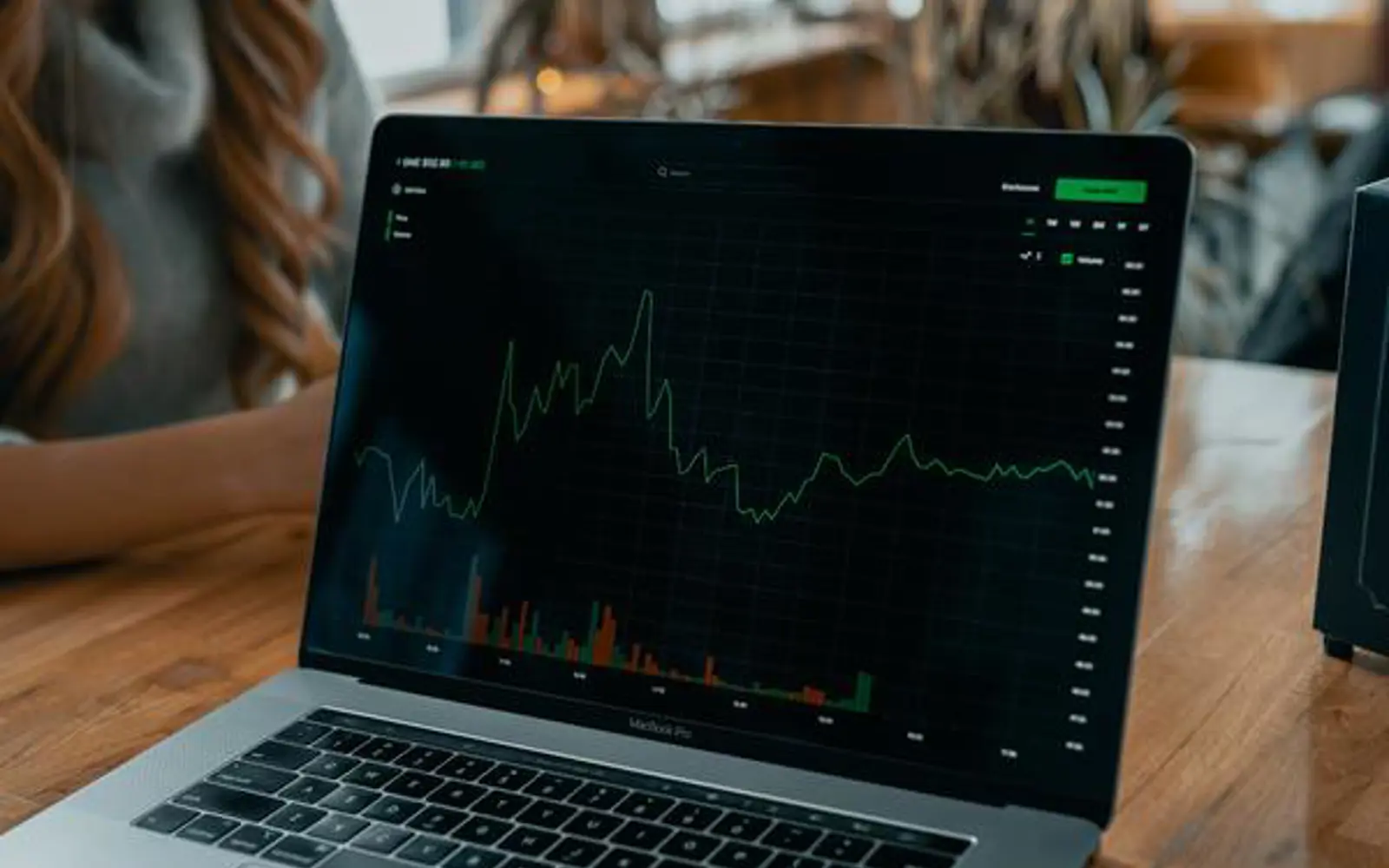 a laptop with a graph on it