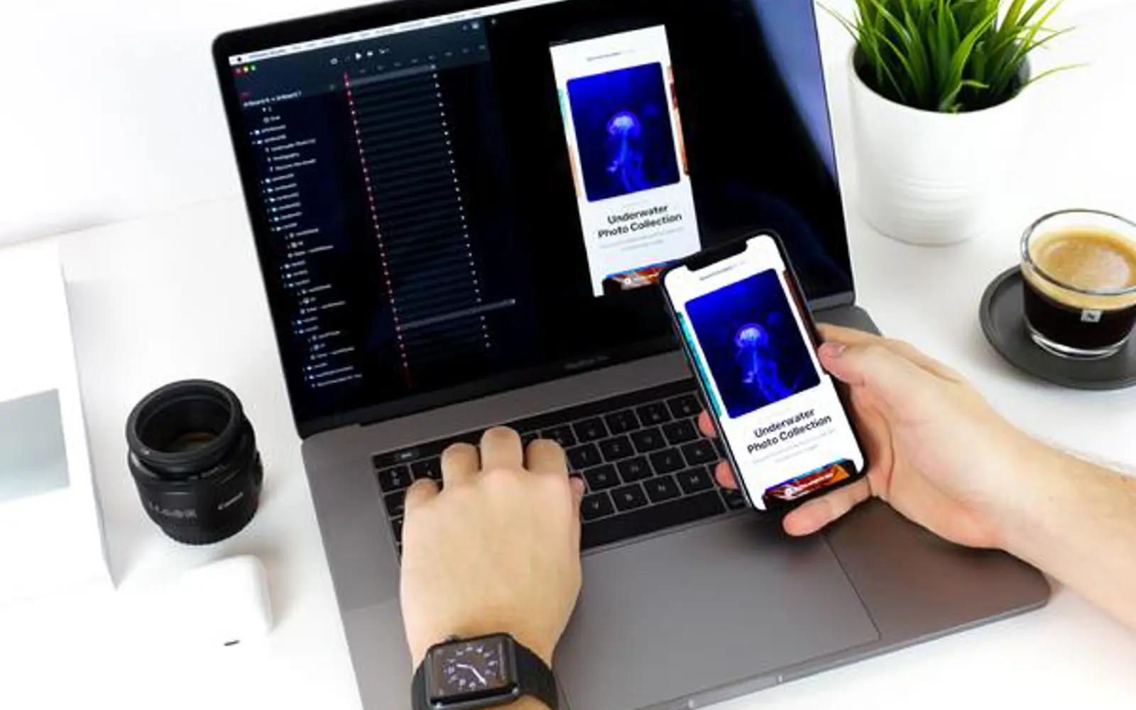 a person using a laptop and a phone