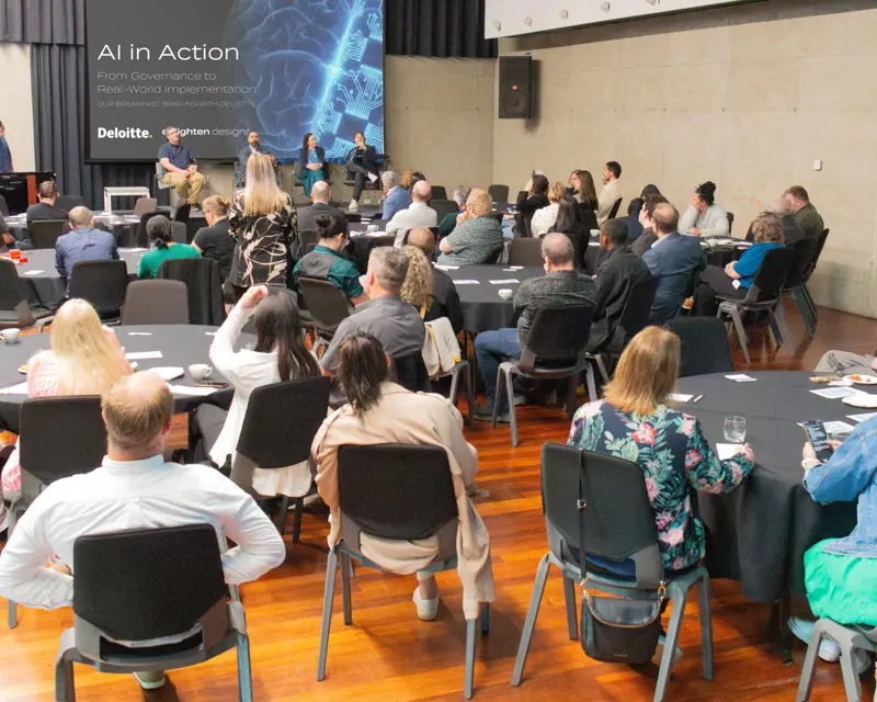 a group of people sitting in a room