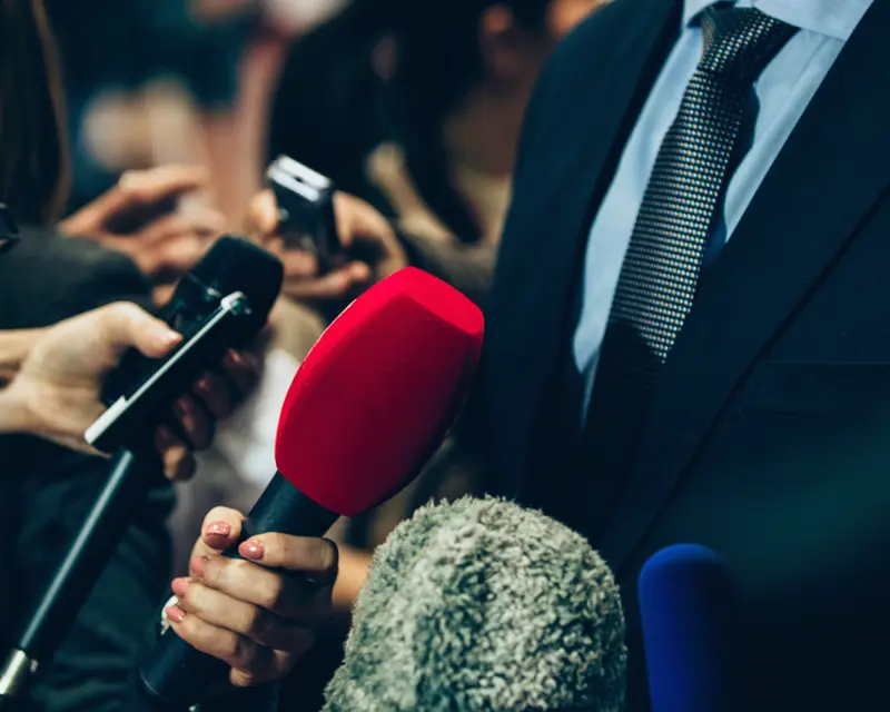 a person holding a microphone