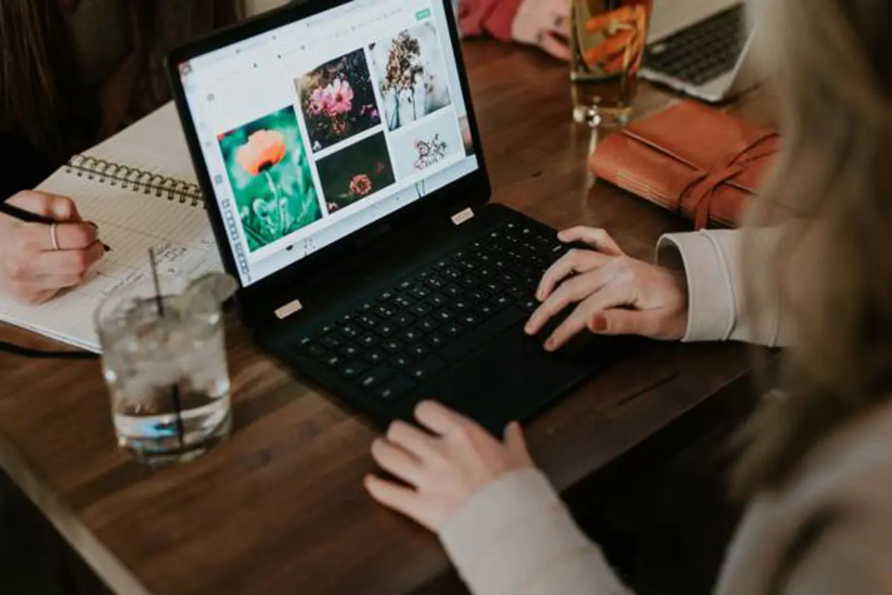a person typing on a laptop