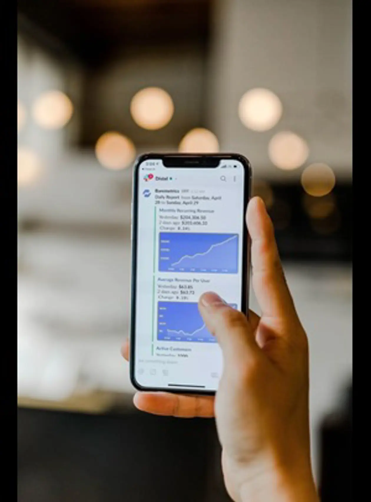 a hand holding a phone